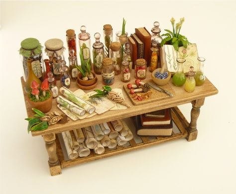 Witch potion table, Nikki Rowe on etsy Potion Table, Miniature Apothecary, Miniature Table, Miniature Halloween, Haunted Dollhouse, Fairy Furniture, Halloween Miniatures, Haunted Dolls, Witch House