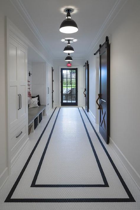 Black and white hexagon floor tiles in a galley mudroom feature two black borders that visually create a longer appearing hall. Bathroom Marble Floor, White Hexagon Floor, Floor Tile Bathroom, Hexagon Floor Tiles, Room Tiles Design, Marble Floor Pattern, Hall Tiles, Hexagon Floor, Bathroom Marble