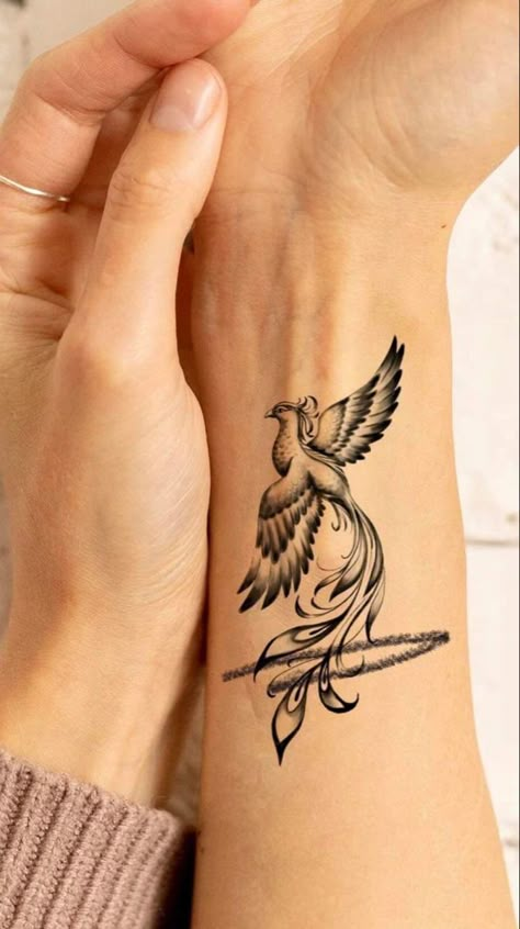 Phoenix Tattoo Design For Women, Phoenix Tattoos For Women, Phoenix Tattoo Ideas, Sagittarius Tattoo Designs, Phoenix Tattoo Feminine, Small Phoenix Tattoos, Art Inspired Tattoos, Meaningful Wrist Tattoos, Phoenix Tattoos