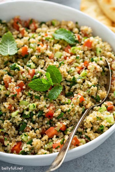 This easy Tabbouleh salad recipe is made with bulgur wheat, fresh herbs, tomatoes, cucumber, and lemon juice. It's so simple and wonderful, with bright and fresh flavors! Serve as a side or on its own. Healthy, vegetarian, light, and great for summer or year round! Bulgar Wheat Side Dish, Bulgur Wheat Recipe, Bulgar Wheat Salads, Bulger Wheat Salads, Bulger Wheat Salad Recipes, Bulgur Wheat Salad, Bulgar Wheat Recipes Salad, Bulgar Salads, Bulgur Salad Recipes