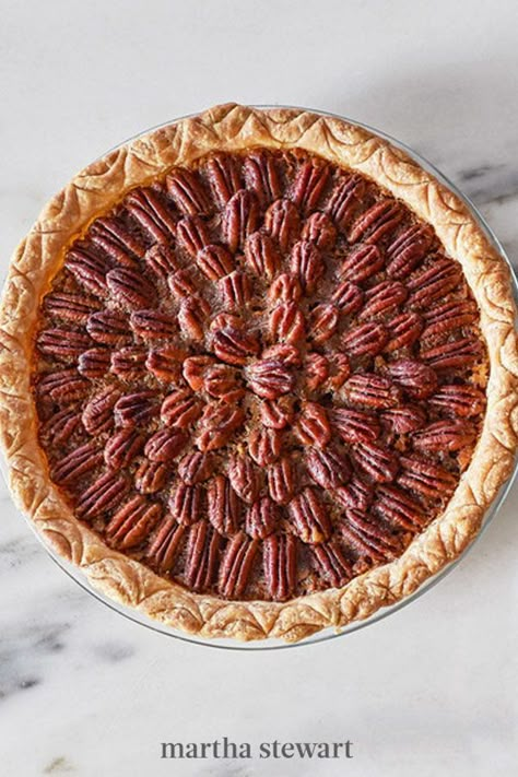 Make this classic pecan pie recipe with a twist, the complex flavors of brown butter and bourbon bring new life into this sweet and nutty pie. Pie lovers alike will appreciate the enhancement of familiar flavors, especially when finished off with a dollop of whipped cream. #marthastewart #recipes #recipeideas #thanksgiving #thanksgivingrecipes #thanksgivingdishes Southern Living Bourbon Pecan Pie, Fancy Pecan Pie, Pecan Pie Design, Brown Sugar Pecan Pie Recipe, Pecan Pie Cake Recipe, Brown Butter Pecan Pie, Pecan Pie Cheesecake Bars, Pear Pie Recipe, Pecan Pie Cheesecake Recipe