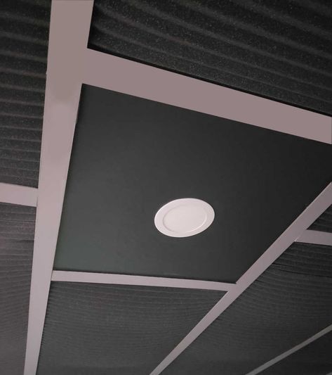 Easy way to makeover an existing drop ceiling. Customize by widening the grid and using acoustic foam for tiles. Update lighting with LED recessed lights. Drop Ceiling Tiles Diy, Diy Drop Ceiling, Black Drop Ceiling, Ceiling Tiles Diy, Drop Ceiling Makeover, Drop Ceiling Basement, Drop Ceiling Panels, Ceiling Makeover, Drop Down Ceiling