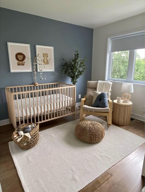 Light Brown Crib Nursery, Nursery Dark Wood Floors, Tranquil Dawn Nursery, Blue And Natural Wood Nursery, Natural Color Nursery, Blue Nursery Aesthetic, Nursery Ideas Scandinavian, Home Decor Ideas Nursery, Gender Neutral Nursery Grey Crib