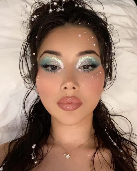 Nazlia | don’t bring me to tears when I just did my makeup so nice.. 🧜🏼‍♀️💧 | Instagram Winter Rave Makeup, Hot Glue Tears Makeup, Ocean Inspired Makeup Looks, Cruise Makeup Ideas, Statue Of Liberty Makeup, Light Under Eye Makeup, Undereye Circles Makeup, Ocean Themed Makeup, Blue Pearl Makeup