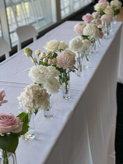 Soft pink and white flowers bud vases Bud Vase Hydrangea, Pink Table Flowers, Pink Bud Vase Centerpiece, Wedding Table Hydrangea, Pink Rose Bud Vase, Soft Pink And White Wedding Flowers, Hydrangea Bud Vase Wedding, Hydrangea In Bud Vase, Pink And White Bud Vases Wedding