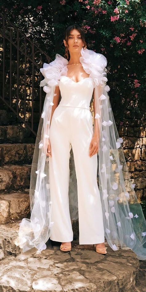 wedding dresses fall 2019 pantsuit simple sweetheart neckline with cape floral appliques esposagroup Pantsuit With Cape, Layered Skirt Wedding Dress, Wedding Pantsuits, Jumpsuit Ideas, Wedding Dresses Fall, Sleek Wedding, Wedding Dress Jumpsuit, Wedding Pantsuit, Cape Wedding