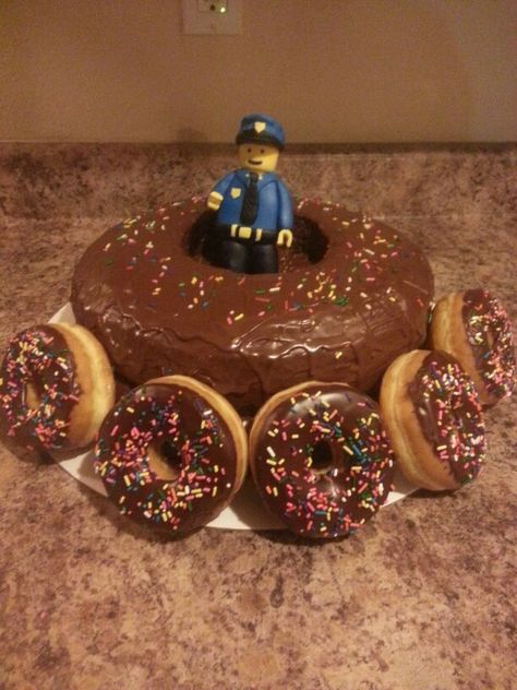 Police theme party donuts cake Police Donut Cake, Police Theme Party, Police Cakes, Fire Party, Donuts Cake, Police Graduation, Police Party, Police Birthday, Donut Cake