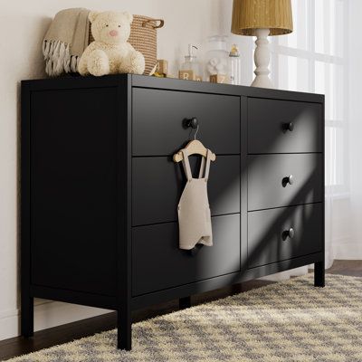 Introducing the Graco Universal 6 Drawer Dresser! Elevate the organization of your nursery or kids' bedroom with our sleek, modern, and spacious dresser. Its clean lines and sturdy construction add both style and ample storage to your nursery or kids' bedroom. For a worry-free assembly experience, the Universal’s drawer tracks are pre-installed to ensure a smooth-gliding drawer experience. The Graco Universal 6 Drawer Dresser’s versatile design makes it easy to match with any style of nursery or Black 6 Drawer Dresser, Black Crib White Dresser Nursery, Black Nursery Dresser, Black Bear Nursery Theme, Wood Dresser Nursery, Black Furniture Nursery, Boy Nursery Dresser, Boy Nursery Furniture, Boys Room Dresser