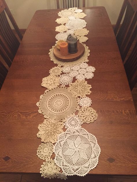 A doily runner I sewed together from an assortment of doilies I've collected. It takes a lot of time but it made the most wonderful gift for my mom's new dining room table. Doily Runner, Doily Art, Doilies Crafts, Table Runner Diy, Eco Decor, Star Quilt Blocks, Crochet Quilt, Crochet Table Runner, Crochet Decoration