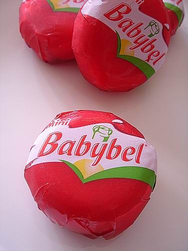 Babybel -  French version of Dutch Edam. Semi-hard cheese made from cow's milk.Texture is smooth. Comes in a net bag w/ ea. piece in a red wax coating. There are seven flavors offered in the US.  A sophisticated cheese on-the-go Edam Cheese, Soft Cheese, How To Make Cheese, Goat Cheese, Beverage Can, Cheese, Canning