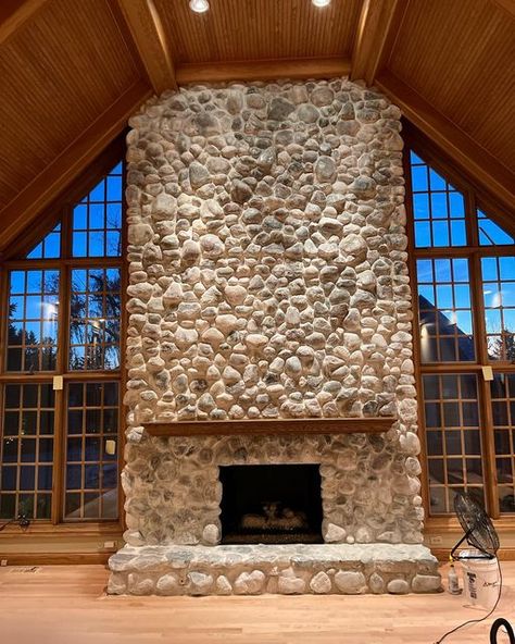 WhiteWashChicago on Instagram: "This was a monster ! River rock fireplace whitewashed using @romabiopaints Limewash with Mild distressing & coated with mineral shield #romabio #limewashedbrick #avoriowhite #limewashed #riverrock #fireplace #romabioavoriowhite #lakeforestillinois" White Washed Rock Fireplace, Washed River Rock Fireplace, Barndo Fireplace, Gray River Rock Fireplace, Riverrock Fireplace, Cobblestone Fireplace, River Rock Chimney Exterior, Large Stone Fireplace, River Rock Fireplace