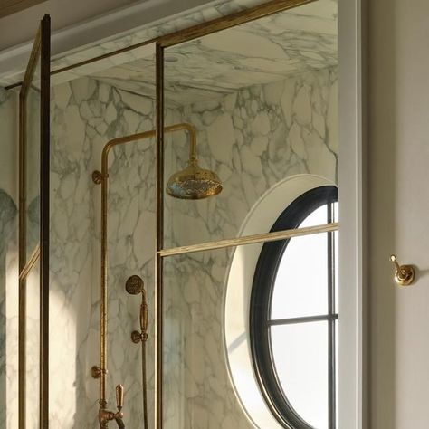 Allison Willson Design on Instagram: "Showering with the morning ☀️ 

The door for our principal ensuite shower was originally designed to just be the door - and not the glass panel beside it. But after sourcing this crazy slab, and specifying these beautiful aged brass doors, I thought why the heck not?! Open it up and show more of everything! 

Also, the verdigris that’s developing on the unlacquered brass fixtures and shower door is so beautiful it actually brings me joy. Weird? Maybe. We all have our things though right? 

Design @allisonwillson 
Photography @patrickbiller" Brass Fixtures, Unlacquered Brass, Brass Door, Shower Door, Glass Panel, Aged Brass, Shower Doors, Glass Panels, The Door