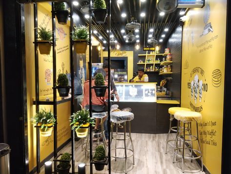 This unit of Belgium Waffle Factory, Kamanhalli was Designed and Executed by Interiorwalaa Waffle Store Design, Waffle Shop Interior Design, Waffle Shop Interior, Outlet Design Food, Belgium Waffle, Spiral Potato, Waffle Shop, Belgium Waffles, Waffle Maker Recipes