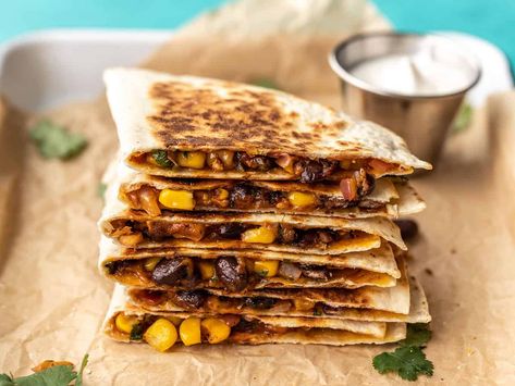 These Hearty Black Bean Quesadillas are an easy vegetarian snack or light meal that are filling, flavorful, and freezer-friendly! Budgetbytes.com Vegetarian Snacks Easy, Bean Quesadilla, Black Bean Quesadilla, Homemade Taco Seasoning Recipe, Taco Seasoning Recipe, Budget Bytes, Egg Free Recipes, Homemade Tacos, Vegetarian Snacks