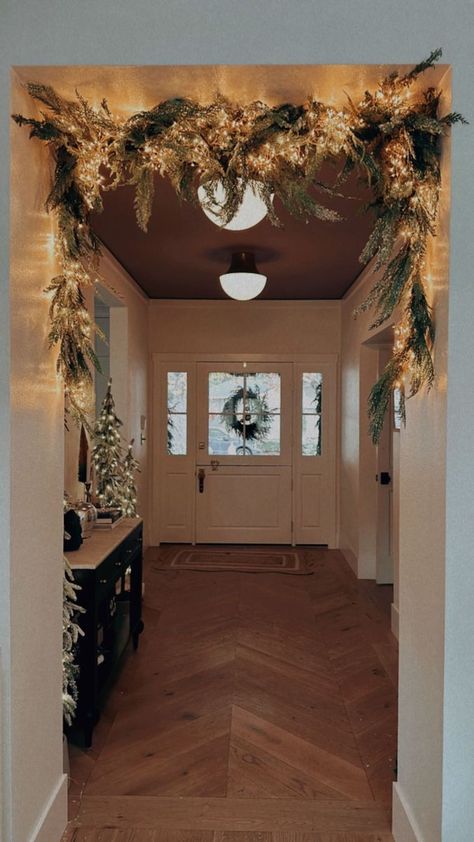 Christmas Doorway Decorations, Happy Thanksgiving Eve, Vine Lights, Doorway Decor, Thanksgiving Eve, Twinkling Lights, Christmas Greenery, Shower Curtain Rods, Indoor Christmas Decorations