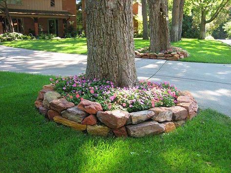 Raised flower bed idea with rocks and stones #flowerbed #flowerpot #planter #gardens #gardenideas #gardeningtips #decorhomeideas Tree Landscaping, Landscaping Around House, Landscaping Around Trees, Landscaping Trees, Lawn Design, Landscaping Tips, Diy Landscaping, Outside Ideas, Landscaping With Rocks