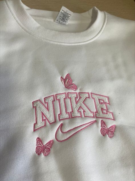 NIKE BUTTERFLY EMBROIDERED SWEATSHIRTS, NIKE SWEATSHIRTS, SWOOSH SWEATSHIRTS, BUTTERFLY BRAND EMBROIDERED CREWNECK, EXCLUSIVE BUTTERFLY EMBROIDERED SWEATSHIRT, CUSTOM BRAND EMBROIDERED SWEATSHIRT/HOODIE Use code FIRST20 to get 20% discount at checkout Bff Hoodies, Sweatshirts Nike, Butterfly Sweatshirt, Nike Crewneck Sweatshirt, Hoodie Diy, Cute Nike Outfits, Diy Sweatshirt, Trendy Hoodies, Shoes Outfit Fashion