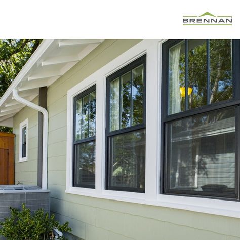 ANDERSEN WINDOWS | Andersen's 100 Series windows are a beautiful option for your home. These windows are made of a Fibrex material which makes them a strong alternative to vinyl windows and a more energy efficient alternative aluminum windows. To learn more about this window or other Andersen windows head over to our website. | #Windows #BlackWindows #AndersenWindows | Brennan Enterprises - Dallas, Texas Mulled Windows Exterior, Two Over One Windows, Black Vs White Interior Windows, Black Aluminum Windows, Double Hung Windows Exterior, Picture Windows Exterior, Large Front Window, Black Vinyl Windows, Exterior Refresh