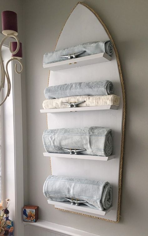 Clever idea for a coastal nautical theme towel storage solution in the bathroom. Featured on Completely Coastal along with other boat shelf ideas to do yourself! Medieval Throne, Gothic Decorations, Boat Shelf, Diy Nautical Decor, Boat Cleat, Diy Nautical, Nautical Diy, Boat Cleats, Throne Chair