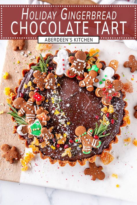 Looking for a dessert that says "wow" at your holiday party? Say hello to the gingerbread chocolate tart! This sweet treat is a match made in heaven, with a spicy gingersnap crust and a decadent, silky chocolate ganache filling. And the best part? It's a cinch to whip up! From aberdeenskitchen.com #gingerbread #chocolate #tart #festive #holiday #dessert #recipe #pie #christmas #baking Holiday Tarts, Gingerbread Chocolate, Pie Christmas, Chicory Recipe, Ganache Filling, Chocolate Ganache Filling, Gingersnap Crust, Festive Desserts, Holiday Dessert Recipes