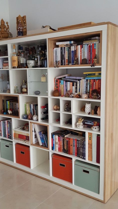 Ikea 5x5 Expedit storage unit  Inner divisions changed and wood added around and inside a few cubes Kallax Library Wall, 5x5 Kallax Ideas, Kallax 5x5 Ideas, Kallax Oak, Kallax 5x5, Dividers For Rooms, Partition Design Modern, Ikea Kallax Bookshelf, Ikea Cubes