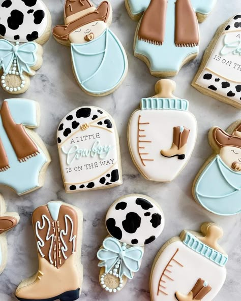 A Little Cowboy Is On His Way Cookies, Western Gender Reveal Cookies, Cowboy Theme Nursery Boys, Cowboy Cakepops, Cowboy Theme Cookies, Cowboy Cookies Decorated, Cow Baby Shower Cookies, Not Her First Rodeo Baby Sprinkle, Western Boy Baby Shower Ideas