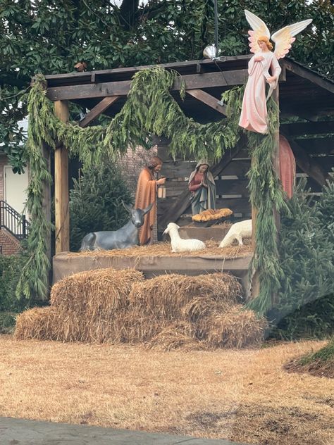 Nativity scene by the church Nativity Scene Christmas Parade Float, Outdoor Navity Scene Ideas, Outdoor Nativity Scene Diy Wood Christmas Yard, Porch Nativity Scene, Live Nativity Scene Ideas Outdoor, Church Nativity Displays, Nativity Stable Diy Outdoor, Diy Nativity Stable Outdoor, Life Size Nativity Scene