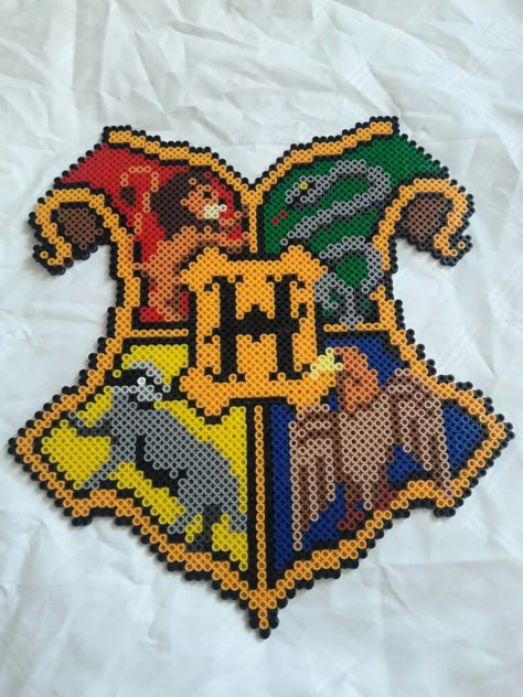 Hogwarts' Crest, Harry Potter Perler Harry Potter Pattern, Harry Potter Iron Beads, Harry Potter Bead Pattern, Hama Beads Patterns Harry Potter, Perler Harry Potter, Perler Bead Patterns Harry Potter, Harry Potter Beads, Hama Beads Harry Potter, Pixel Art Harry Potter