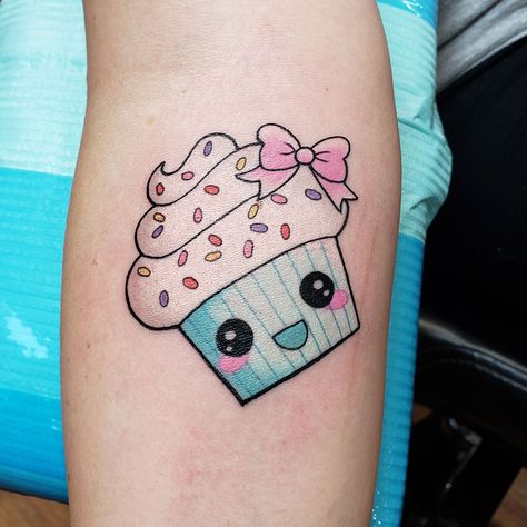 Cute little cupcake tattoo done by Doozer Soto #cupcaketattoo #cutetattoos #doozersototattoo #happylittlecupcake #sprinklescupcakes #iowatattoo #tagtheqc #quadcitiesiowa #midwesttattoo