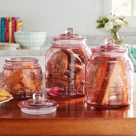 A set of three glass storage canisters from the Pioneer Woman collection so you can store all the amazing treats you'll be baking with the above bakeware set! Is there anything in the world that brings more joy than a cookie jar full of perfectly chewy cookies?! Get this set and you're basically buying edible joy. Country Tablescapes, Champagne Christmas, Glass Kitchen Canisters, Pioneer Woman Ree Drummond, Pioneer Woman Kitchen, Purple Kitchen, Kitchen Wall Hangings, Ree Drummond, Glass Canisters