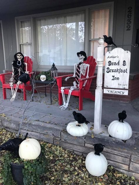 Halloween Porch Ideas Skeletons, Haunted Hotel Halloween Decorations, Adams Family Outdoor Decor, Haunted House Porch, Skeleton Sitting In Chair Halloween, Haunted Hotel Decor, Halloween Hotel Party, Dead And Breakfast Halloween, Haunted Hotel Party