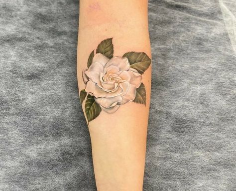 Are you looking for a tattoo that represents grace, purity, and gentleness? Then here are some beautiful Gardenia Flower Tattoo ideas for you to check out! Grandmother Tattoo, Gardenia Tattoo, Wrist Bracelet Tattoo, Magnolia Tattoo, Gardenia Flower, Tattoos To Cover Scars, Flower Tattoo Meanings, Daisy Tattoo, Small Flower Tattoos