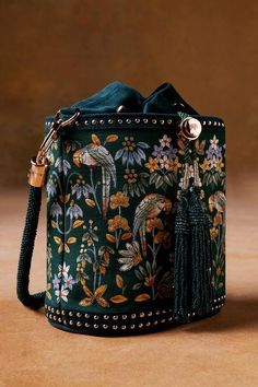 Luxury Bohemian Bags With Embellishments, Cheap Bohemian Bags With Floral Embroidery, Luxury Traditional Shoulder Bag With Zari Work, Luxury Floral Embroidery Bags For Festive Season, Cheap Embroidered Women's Bags, Luxury Bohemian Hand Embellished Bags, Luxury Floral Embroidery Bags For Women, Luxury Bags With Intricate Embroidery For Festivals, Luxury Embroidered Bags For Spring