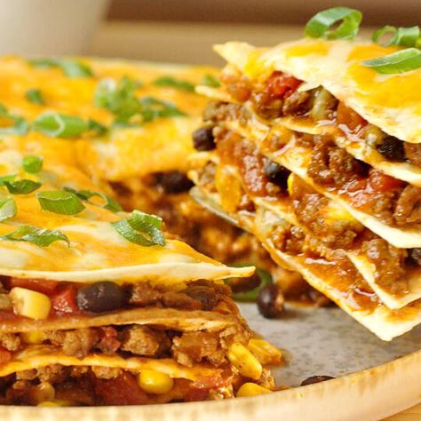 Tortilla Wrap Casserole, Tortilla Lasagna Recipe, Layered Tortilla Bake, Spanish Lasagna Recipes, Mexican Tortilla Lasagna, Mexican Tortilla Lasagna Recipe, Taco Lasagna With Tortillas, Lasagna Bake Time, Fajita Lasagna With Tortillas