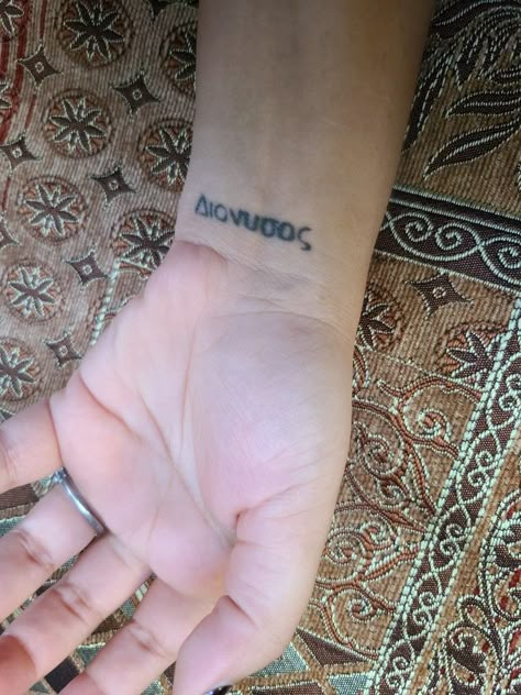 Dionysus in Greek Tattoo Small Greek Mythology Tattoos, Dionysus Tattoo, Inner Tattoo, Child Of Dionysus, A Tatoos, Percy Jackson Tattoo, Silly Tattoos, Clavicle Tattoo, Greek Tattoo