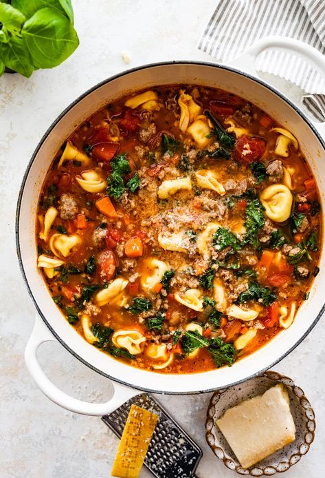 Italian Sausage Tortellini Soup Kale Tortellini Soup, Kale Tortellini, Tortellini Soup Recipes, Hospitality Meals, Italian Sausage Tortellini, Italian Sausage Tortellini Soup, Postpartum Recipes, Chicken Barley, Peas Recipes