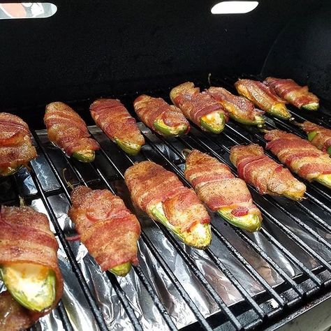 We can never say no to bacon-wrapped jalapeño poppers. 📷: @bbqnwithjj Traeger Bacon, Smoked Jalapeno Poppers, Wood Pellet Grill Recipes, Grilled Jalapeno Poppers, Jalapeno Poppers Recipe, Traeger Cooking, Traeger Grill Recipes, Bacon Wrapped Jalapeno Poppers, Smoked Jalapeno