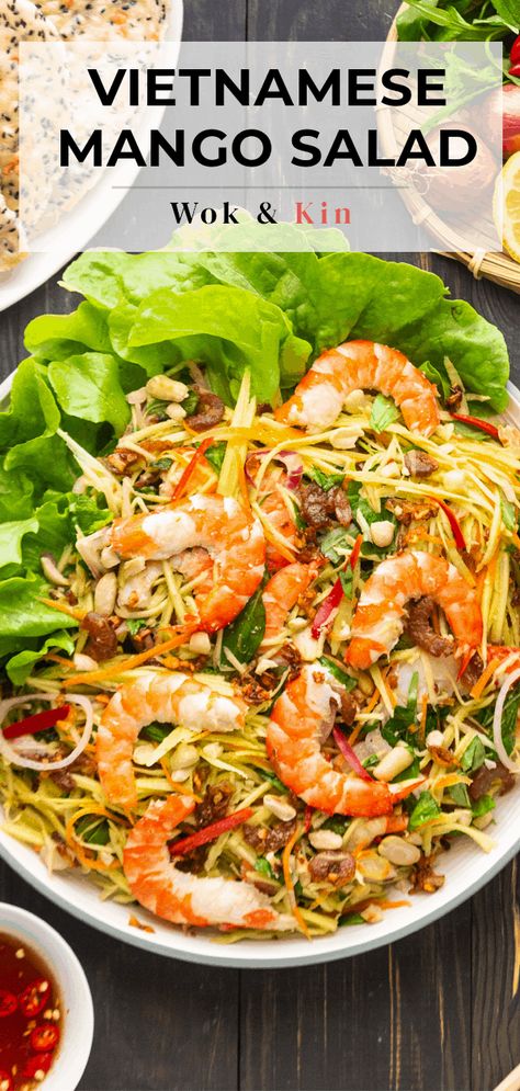 You won't find a salad more fresh than our Vietnamese Mango Salad! The shredded fruit and vegetables give the perfect amount of crunch. It pairs beautifully with succulent prawns and is infused with a classic sweet and savory dressing that makes it tasty AND healthy! #mangosalad #vietnamesemangosalad #vietnamesesalad Prawn Mango Salad, Easy Vietnamese Recipes, Dinner Rolls Easy, Classic Dressing, Prawn Salad, Asian Salad, Mango Salad, Vietnamese Cuisine, Shrimp Salad