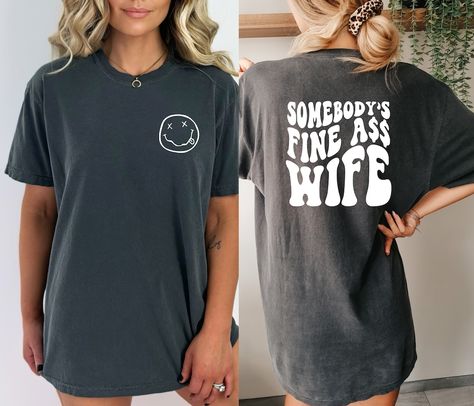 This Gender-Neutral Adult Graphic Tees item by TalkingTees316 has 112 favorites from Etsy shoppers. Ships from Port Saint Lucie, FL. Listed on Apr 14, 2023 Engagement T Shirt Ideas, In My Fiance Era, Bride Tshirt Ideas, Fiance Clothes, Fiancé Shirt, Fiance Outfit, Bride Tee Shirts, Fiancee Shirt, Engagement Shirts