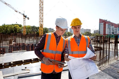 Structural engineer and construction manager dressed in orange work vests and helmets discuss by leikapro. Structural engineer and construction manager dressed in orange work vests and helmets discuss documentation on the op... #AD #manager, #dressed, #orange, #Structural Construction Site Safety, Construction Manager, Structural Engineer, Safety Procedures, Risk Assessment, Construction Safety, Health Administration, Risky Business, Construction Workers