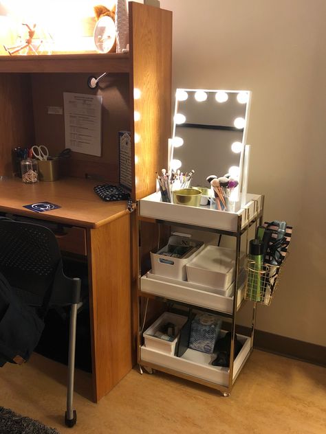 Penn State dorm makeup cart and lighted mirror Dorm Corner Ideas, Makeup Dorm Organization, College Dorm Vanity Ideas, Dorm Makeup Mirror, College Dorm Mirror, Dorm Room Cart Ideas, Dorm Room Mirror Ideas, Dorm Desk Mirror, How To Organize Dorm Room