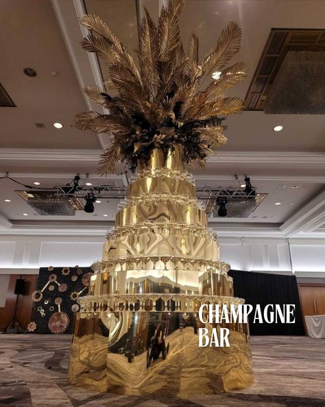 You’re so Golden 🌟 Get ready to dazzle with our GOLD THEMED decor collection! From golden leaves and LED lighting to champagne bars, we have everything you need for an Outdoor Summer Event or an Autumn Gala. Add a golden glow to your next event 🍾 info@event-trees.com #goldthemed #goldevent #floraldesign #foliage #eventdecor #foliagedesign #eventstyling #corporateeventdecor #corporateeventstyling #eventinspiration Champagne Bars, Casino Birthday Party, Casino Birthday, James Bond Theme, Corporate Events Decoration, Champagne Tower, Champagne Bar, Gold Color Scheme, Venue Decor