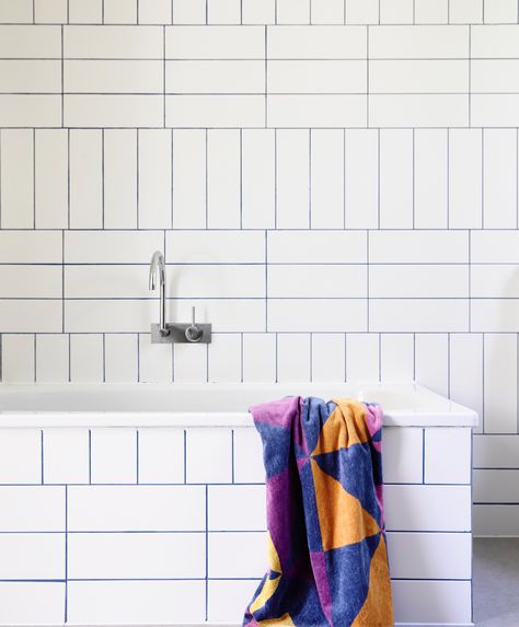 Think Outside the Subway: 17 Bathroom Tile Ideas & Trends White Tiles Blue Grout, White Tile With Colored Grout, Blue Grout Bathroom, White Tile With Blue Grout, White Tile Blue Grout, Tile With Colored Grout, Subway Tile Patterns Bathroom, Blue Grout, Colored Grout