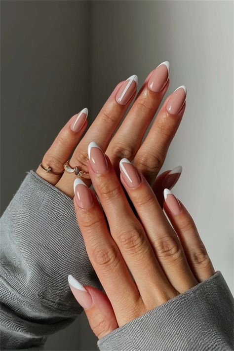 Looking for simple nail ideas that enhance your natural nails? Try a chic nude base with a delicate white line art design on the tips. This minimalist approach adds a touch of elegance while showcasing the beauty of your natural nails. Perfect for any occasion, these nails are both stylish and low-maintenance, making them ideal for the busy individual. Discover the beauty of simplicity! Nail Ideas For Natural Nails, Ideas For Natural Nails, Simple Nail Ideas, White Line Art, Line Art Design, Simple Nail, White Line, Elevate Your Look, Simple Nails