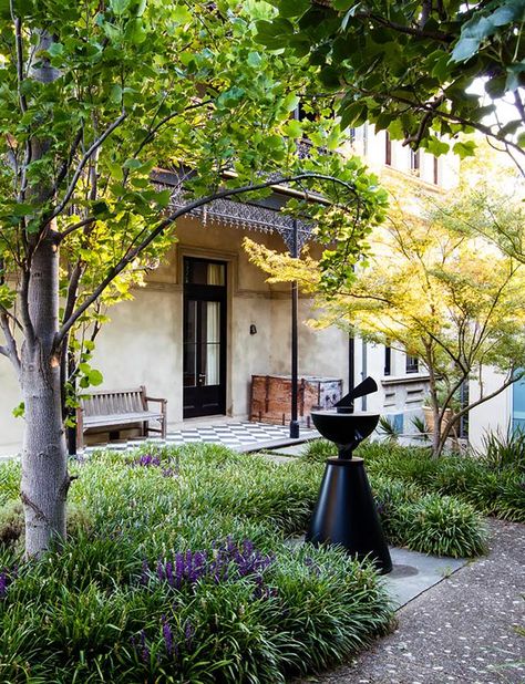 A sculptural sundial in powdercoated steel, titled Observatory by Melbourne-based artist Simon Perry, is a fitting folly in this semi-formal front garden Beautiful Courtyards, Melbourne Garden, Australian Garden Design, Melbourne Architecture, Australian House, Bee Friendly Garden, Front Garden Design, Australian Garden, Formal Garden