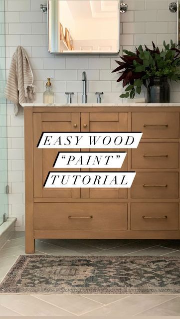 Painted Vanity To Look Like Wood, Refinish Bathroom Vanity Cabinet, Faux Wood Bathroom Vanity, Diy Vanity Painting Ideas, Paint Vanity To Look Like Wood, Bathroom Vanity Makeover Diy, Natural Organic Bathroom, Builder Grade Vanity Makeover, Refinishing Bathroom Vanity