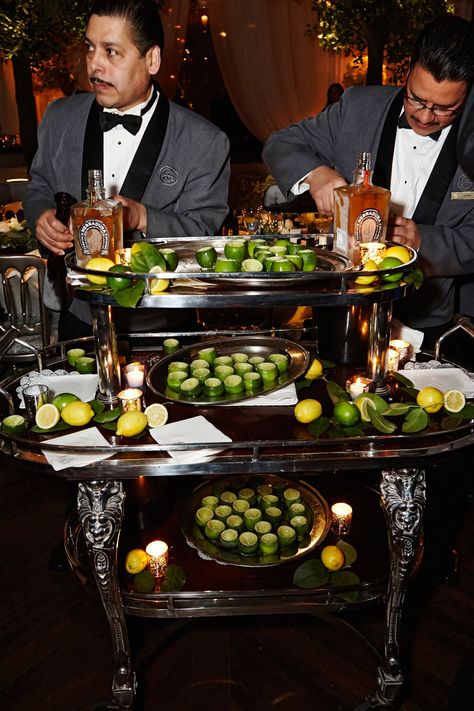 large-bar-cart-with-hollowed-out-limes-for-shot-glasses-tequila-tequila-herradura-and-limes-servers Tequila Cart Wedding, Cocktails Cart, Tequila Tasting, Smith Wedding, Tequila Bar, Wedding Food Drink, Catering Display, Inside Weddings, Mexican Party Theme