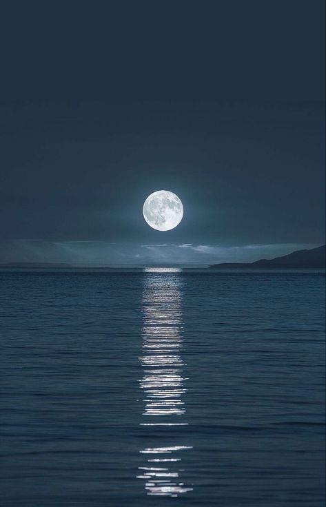 Beautiful image of the moon reflecting from the ocean in the midnight Meditation Pictures, Full Blue Moon, Spooky Halloween Pictures, Moon Sea, Valencia City, Moon Beach, Moonlight Photography, Blurred Lights, Blue Moon Photography