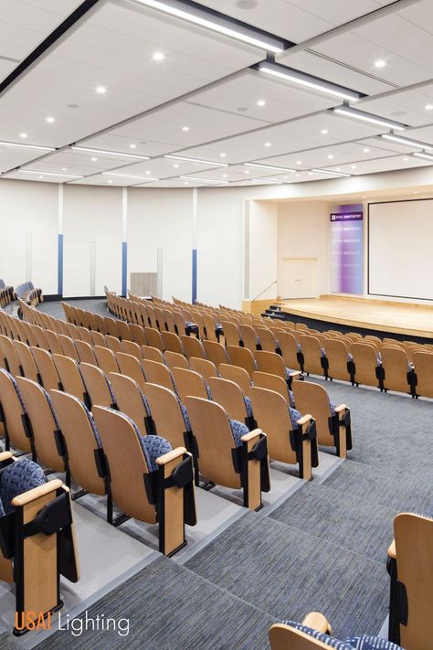 Lecture halls with tall ceilings demand powerful light fixtures with low UGR for visual comfort and less glare when performing tasks such as reading and writing. BeveLED downlights are your perfect light source for this need. . . . Architect: Perkins Eastman Designer: Cline Bettridge Bernstein Lighting Design Photographer: Sarah Mechling / Perkins Eastman . . . #beveleddownlights #lecturehalllighting #lightingforeducationalspaces Tall Ceiling Light Fixtures, Lecture Hall Interior Design, College Lecture Hall, Rutgers Newark, Lecture Hall Design, Nyu College, College Lecture, Modern University, Interior Design Lobby