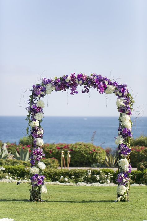 Wedding Ceremony Flower Arch. Purple, white wedding arch. Orchids, hydrangea, roses, lisianthus. Montage, Laguna Beach. Florals by Jenny Purple Beach Wedding Ideas, Purple Wedding Arch, Ceremony Flower Arch, Beach Florals, Purple Beach Wedding, Purple White Wedding, Ceremony Arches, Purple Reception, White Wedding Arch